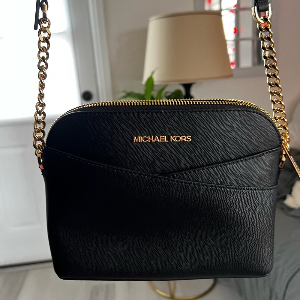Black and gold Jet Set with tag, never used.